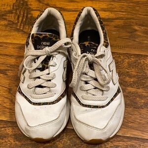 New Balance 997H sneaker with a leopard print accent.